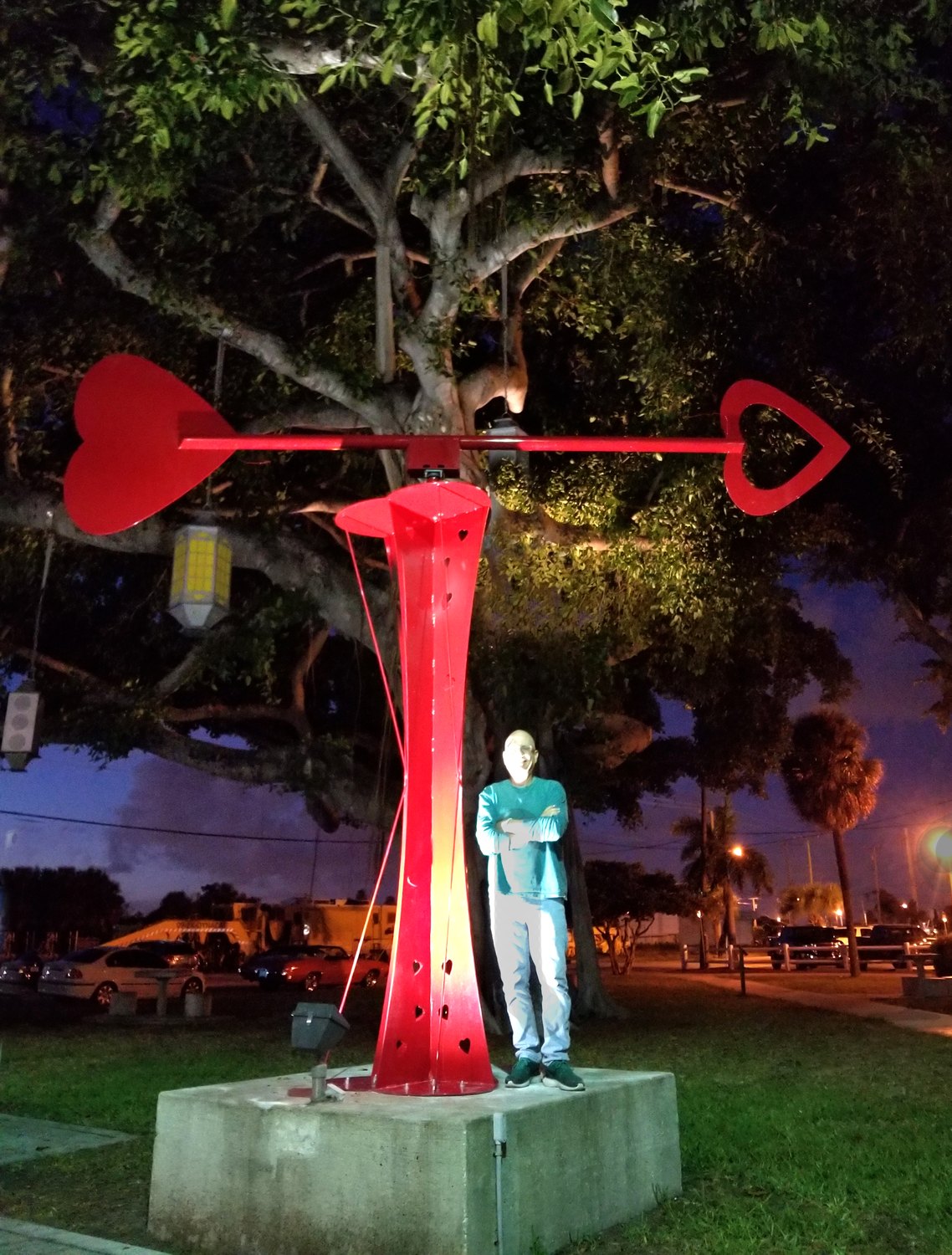 Lloyd Goradesky with Let LOVE Guide Your Way sculpture